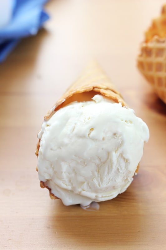 homemade ice cream in waffle cone on table