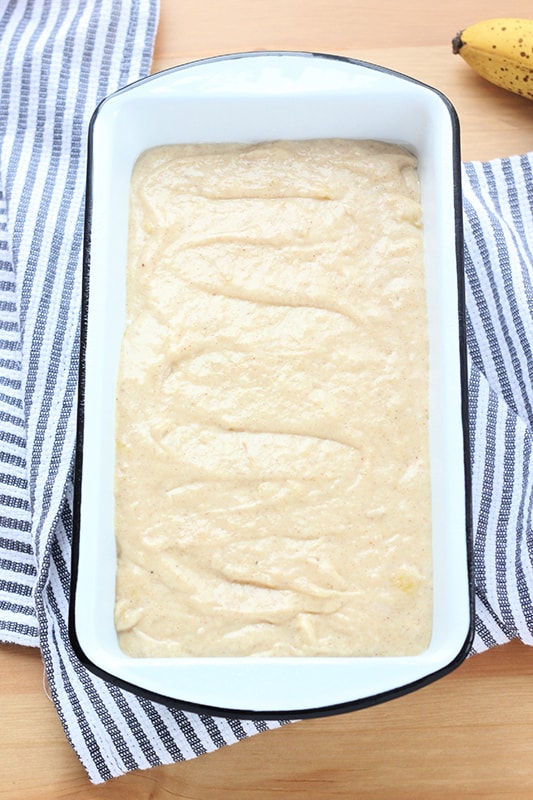 banana bread batter poured into a baking tin ready for the oven