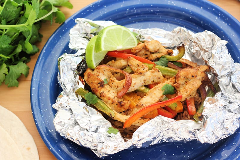 foil dinner on a blue camping plate