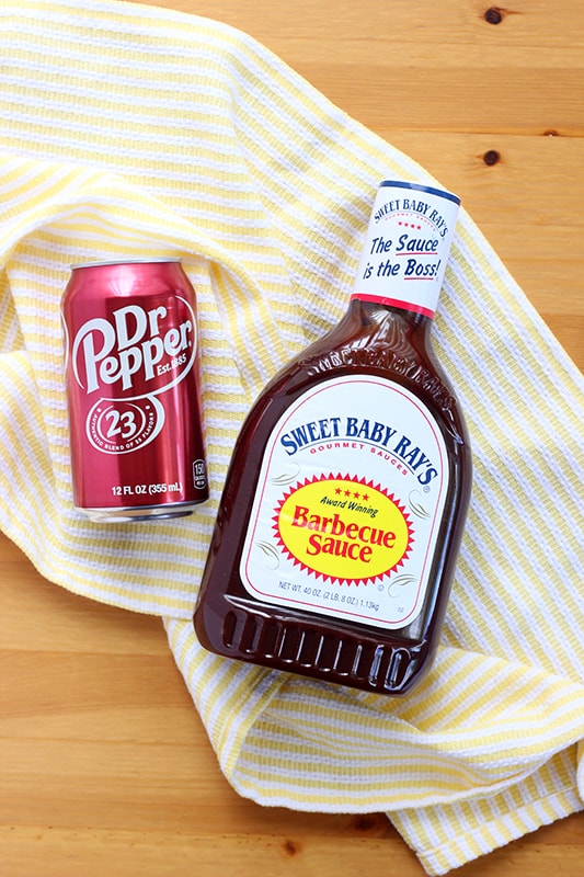 Can of Dr. Pepper soda and Barbecue sauce on yellow napkin