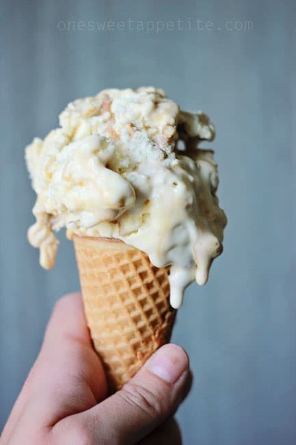 caramel swirl pretzel ice cream in a sugar cone