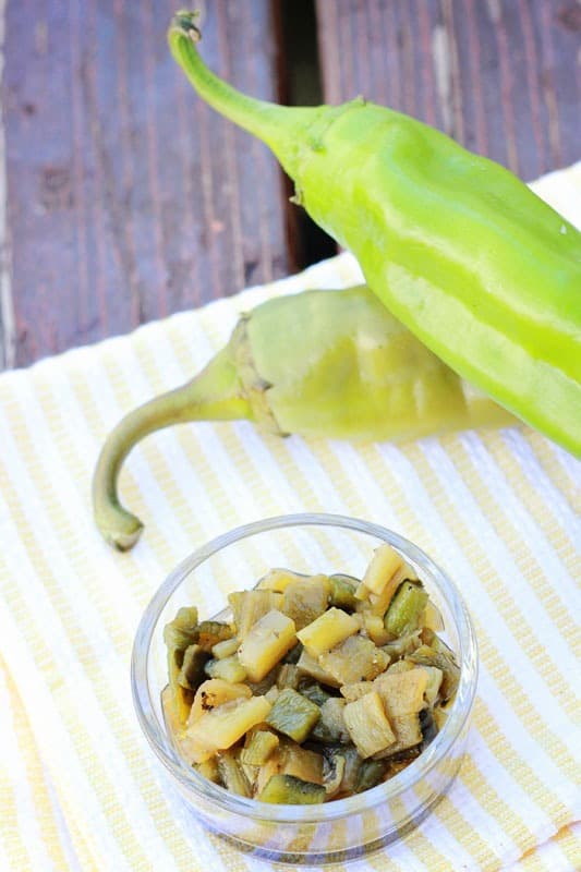 cheesy stuffed burgers with roasted hatch chile relish 