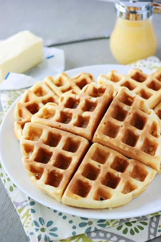 stack of waffles on a white plate