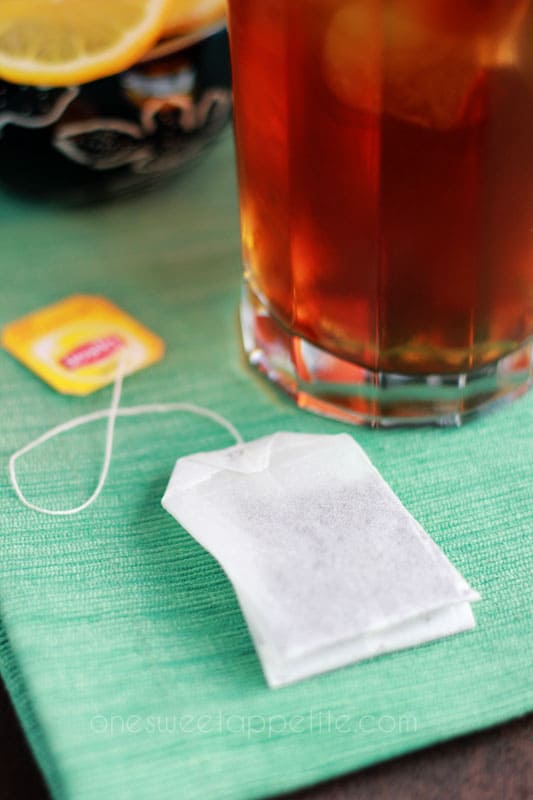 lipton tea bag sitting on a green napkin