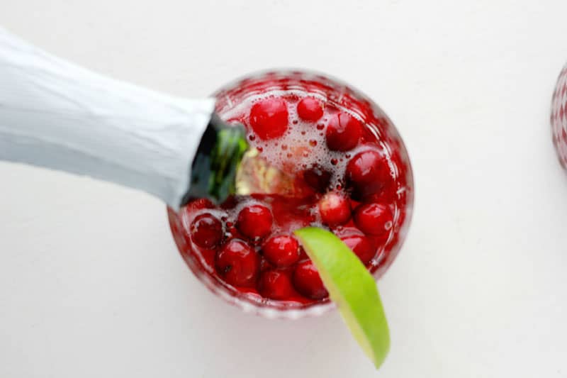 champagne being poured into small glass