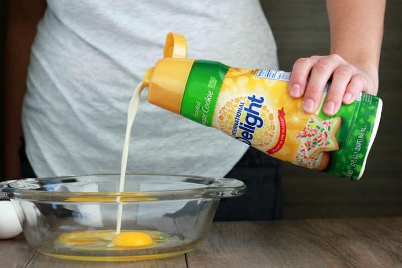 sugar cookie creamer poured into a dish with eggs