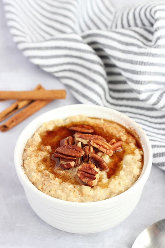 bowl of brown sugar oats with a blue stripe napkin