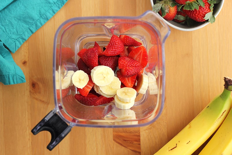 strawberries and bananas in a blender