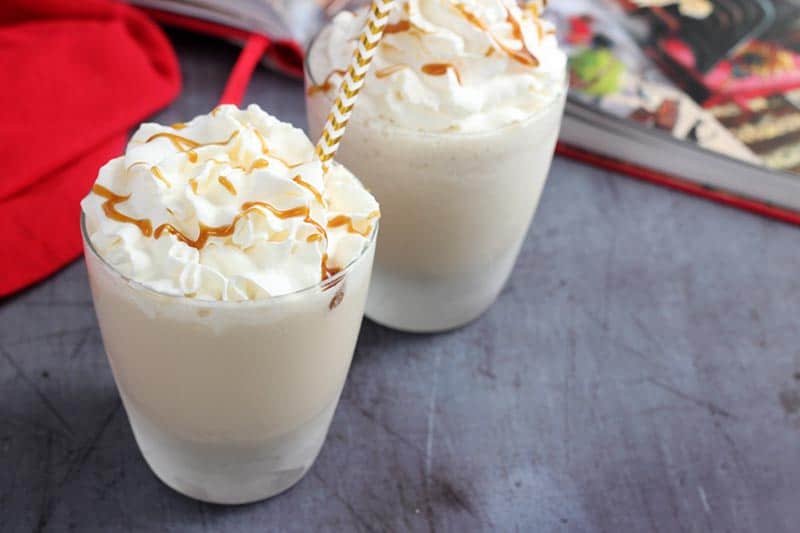 frozen butterbeer with whipped cream in glasses
