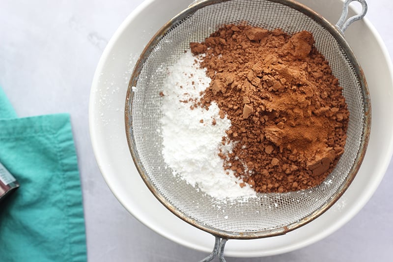 Hot chocolate mix ingredients in a shifter 