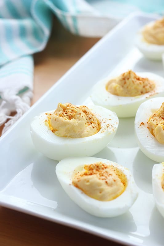 deviled eggs placed onto a white plate
