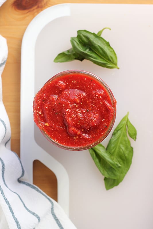 Homemade Pizza Sauce in a Jar with Fresh Basil