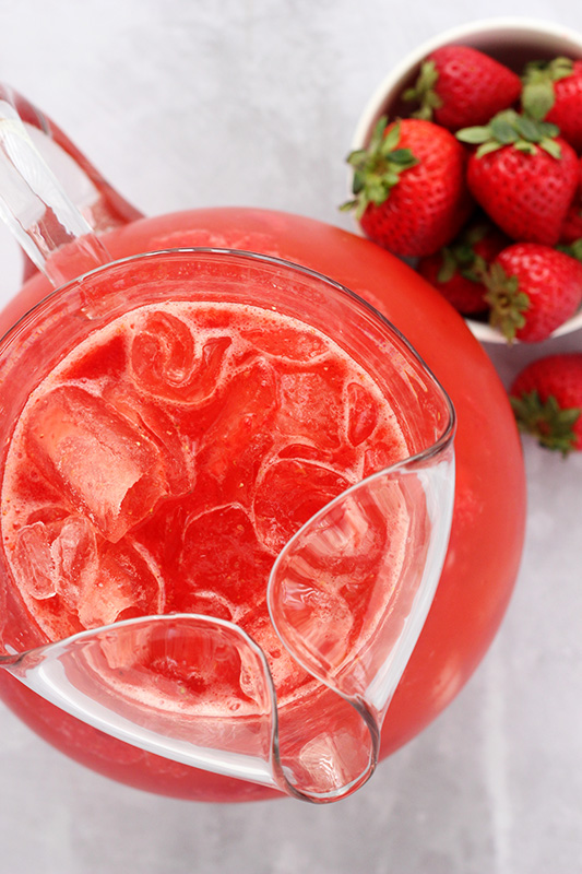 top down image of a pitcher filled with strawberry punch