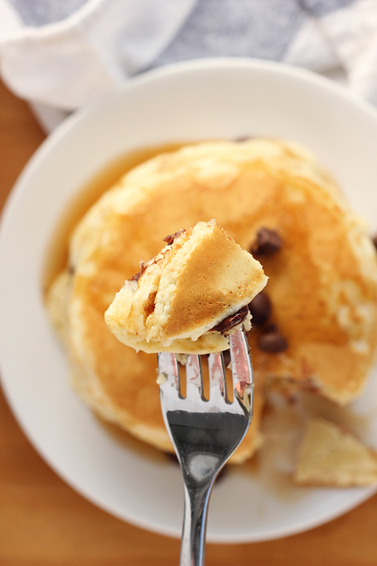 bite of pancake on a fork with chocolate chips