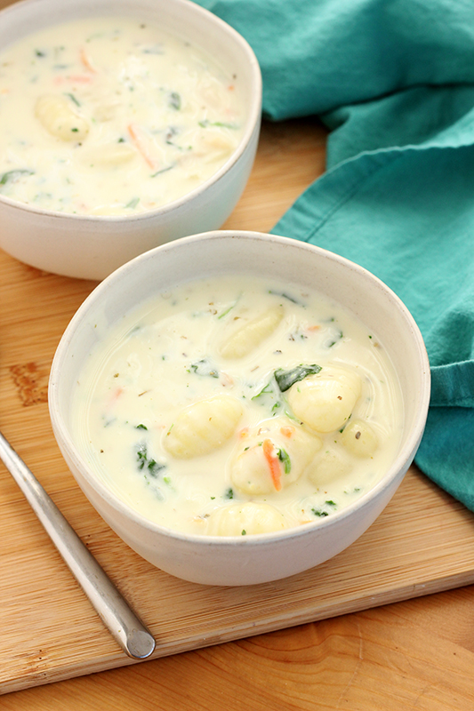 two bowls of chicken gnocchi soup 