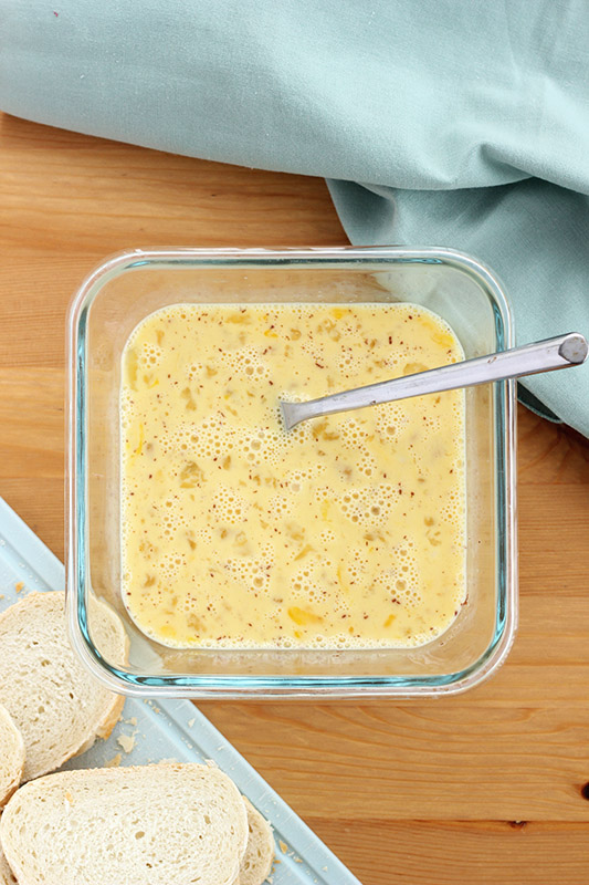 bowl of custard for french toast with a fork inside