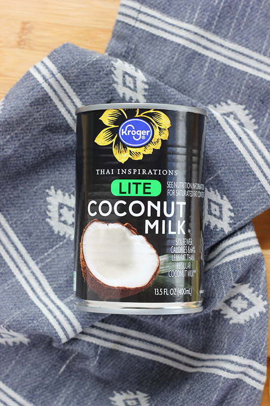 can of coconut milk on a blue napkin