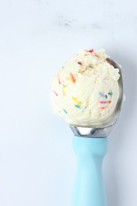 ice cream scoop with one scoop of birthday cake ice cream
