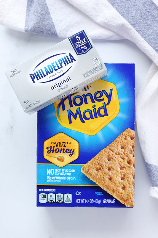 box of graham crackers and cream cheese on a white table top