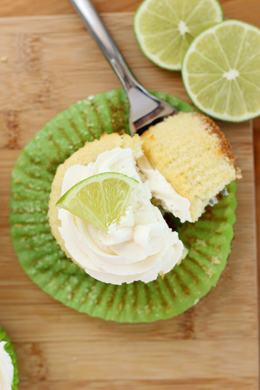lime cupcake with a bite on a fork