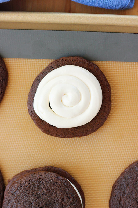 bottom of a whoopie pie with frosting swirled on top