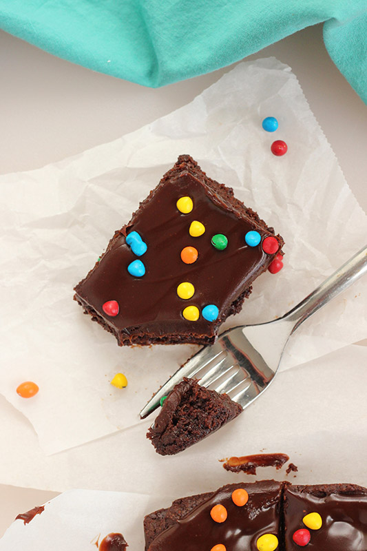 single brownie with a bite sitting on a fork