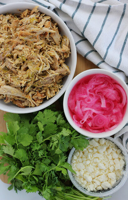 Slow Cooker Pulled Pork Tacos - One Sweet Appetite