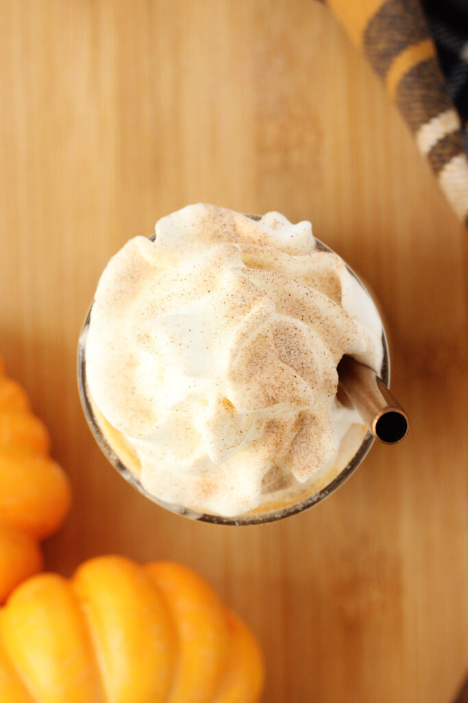 top down image of a glass and whipped cream