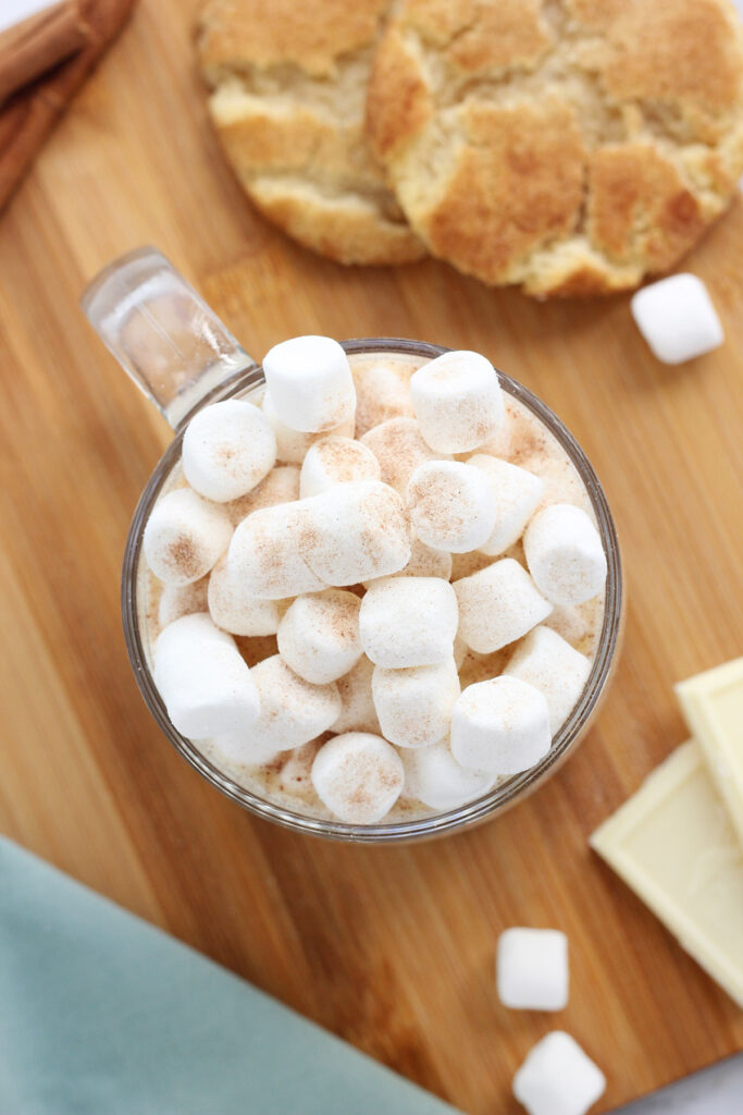top down image of a glass mug filled with mini marshmallows