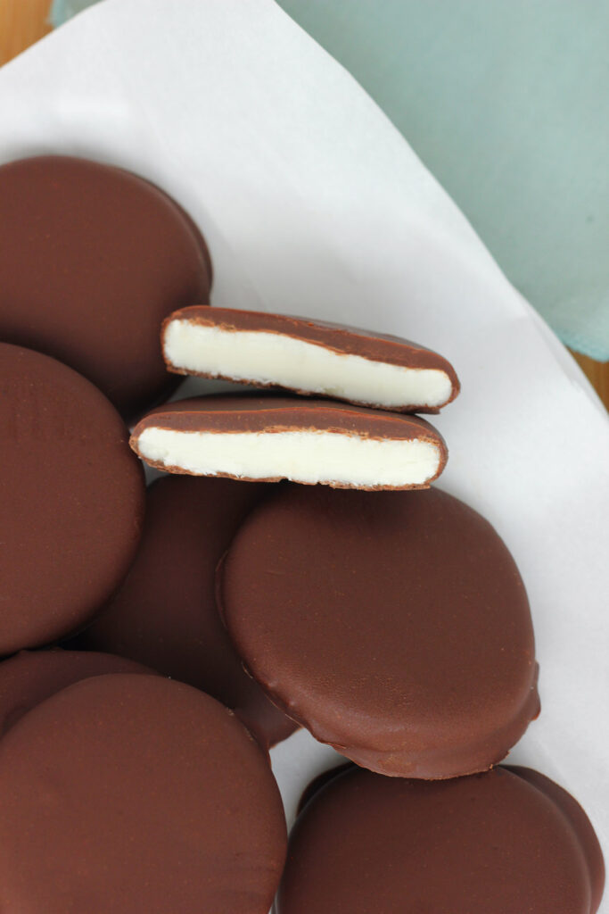 homemade peppermint chocolate candy on a white piece of parchment paper