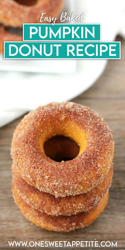 pinterest graphic image of three donuts that are stacked on a wooden table with text overlay reading "easy baked pumpkin donut recipe" 
