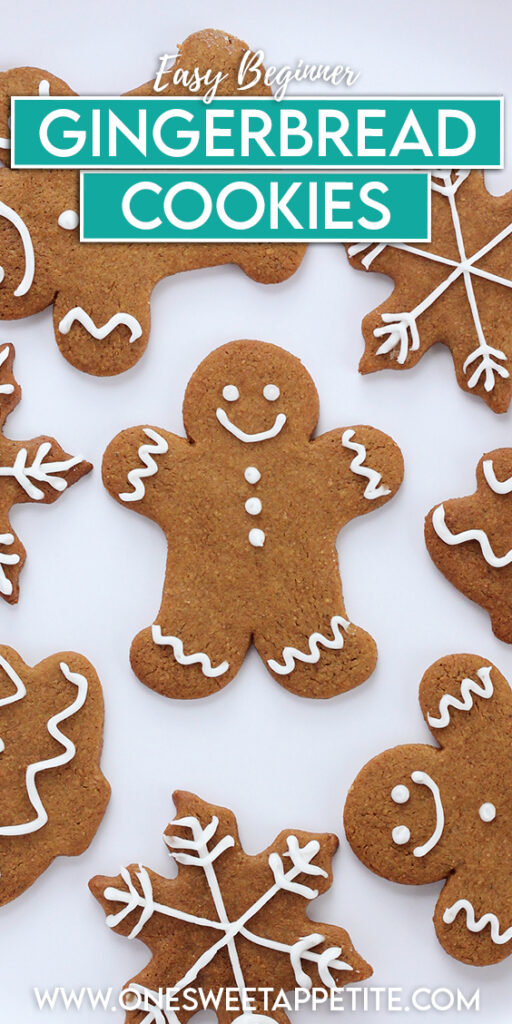 top down shot showing a large white plate layered with holiday shaped gingerbread cookies that have been lightly decorated with a white frosting. Shapes include men, snowflakes, and trees. Text overlay reads "easy beginner gingerbread cookies