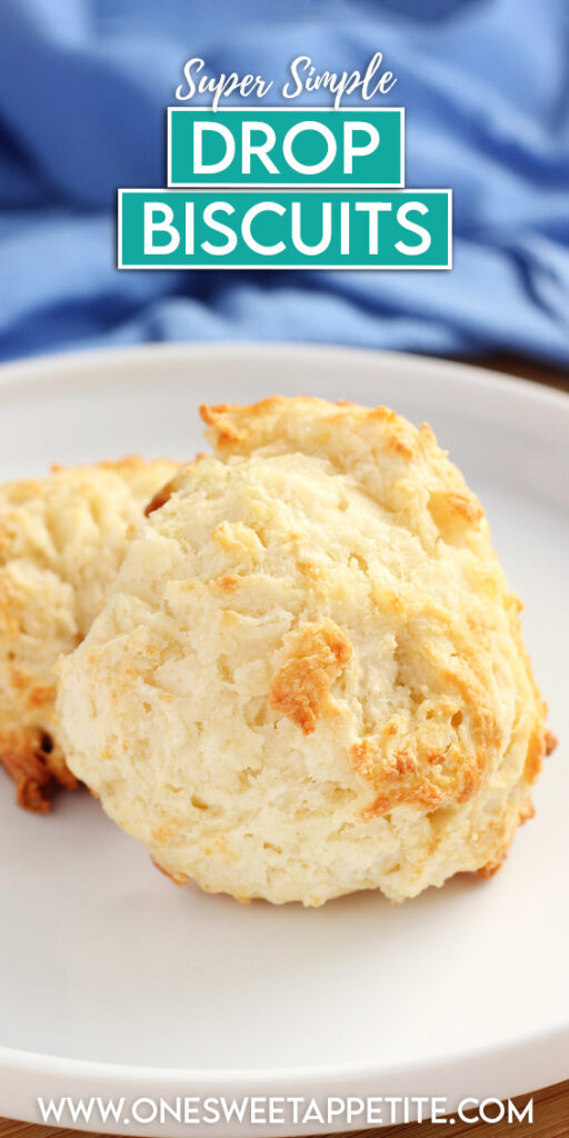 close up image of two biscuits on a white plate with a blue napkin off in the background. Text overlay reads "super simple drop biscuits"