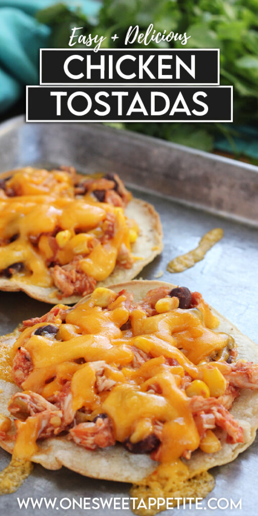 Close up image of a corn tortilla on a metal baking pan topped with shredded chicken, black beans, corn, and melted cheese. Text overlay reads "easy + delicious chicken tostadas"