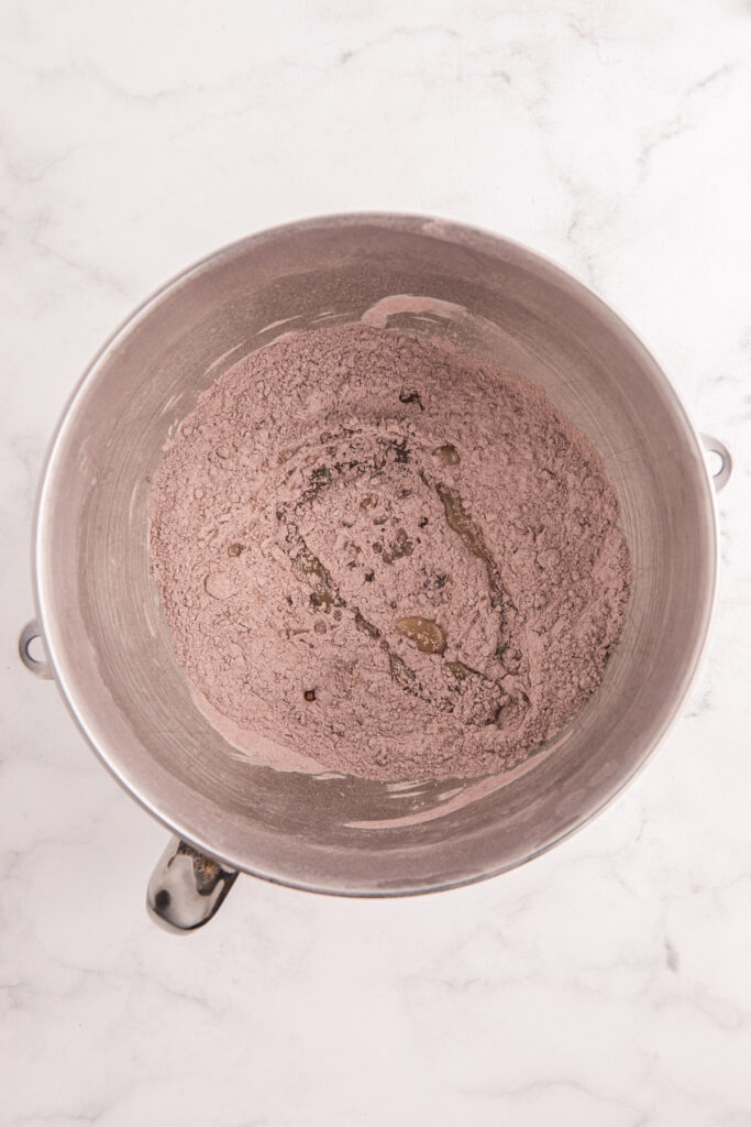top down image showing a bowl with flour and cocoa powder mixed together