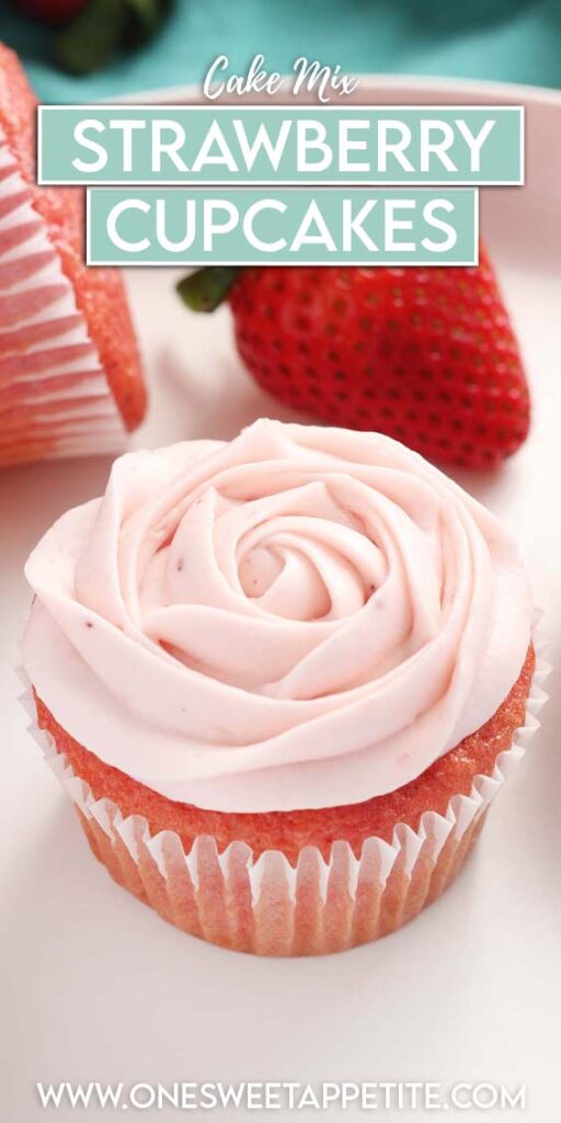 close up image showing a white plate with pink cupcakes. The frosting is piped to look like a rose. there is a strawberry in the background with a teal napkin. Text overlay reads cake mix strawberry cupcakes