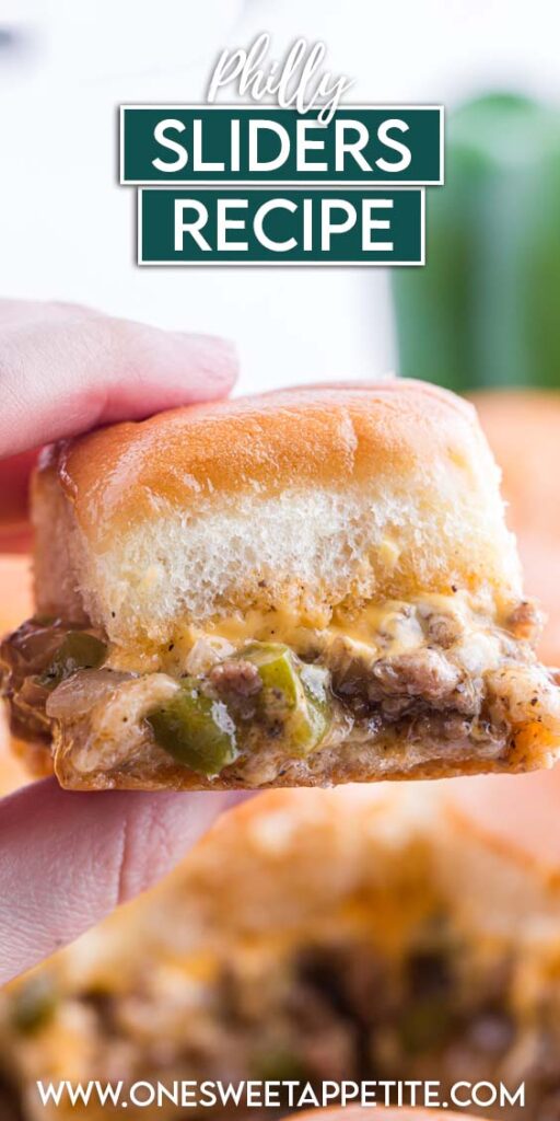 close up image showing a slider filled with ground beef and melted cheese held by a hand with text overlay reading "Philly Sliders Recipe"