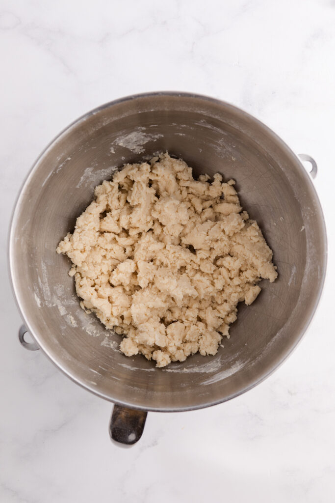 top down image showing the inside of a mixing bowl filled with cookie dough