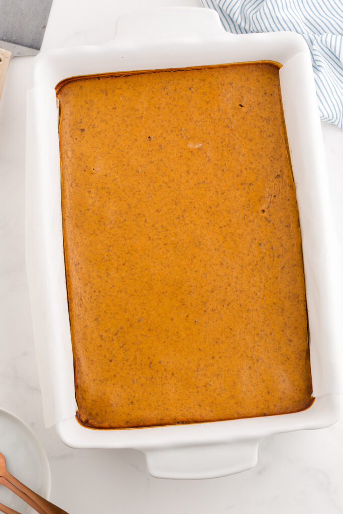 top down image showing a white baking dish filled with baked pie filling