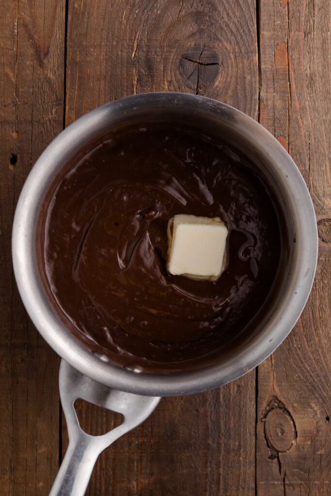 chocolate sauce inside a pan with butter