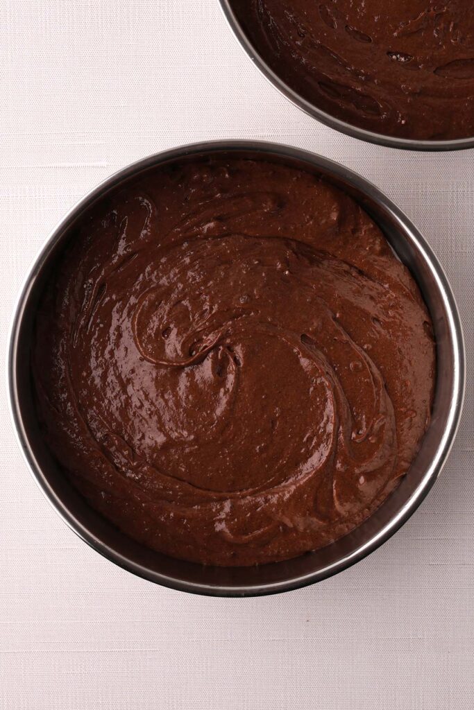 unbaked cake inside of a cake pan