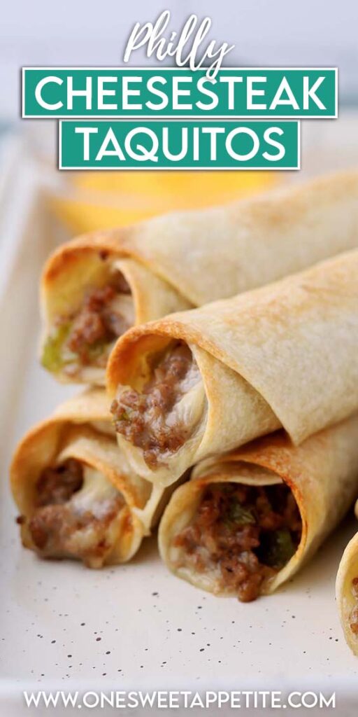 close up image showing crispy taquitos on a white tray with cheese in the background. Text reads "philly cheesesteak taquitos"