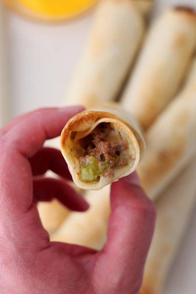 top down image showing the inside of a beef taquito