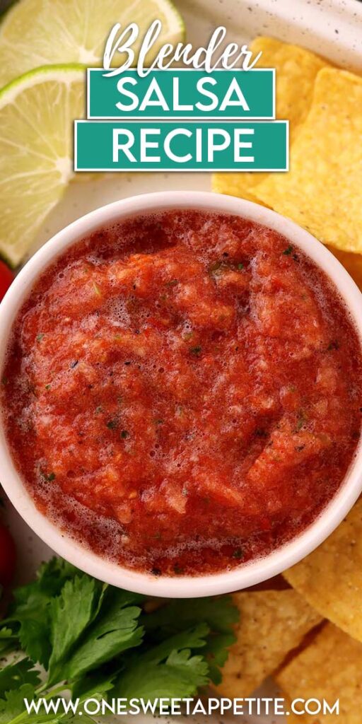 Top down image showing a small white bowl filled with salsa. There are chips, cilantro, tomatoes, and limes on the side. . Text overlay reads "blender salsa recipe"